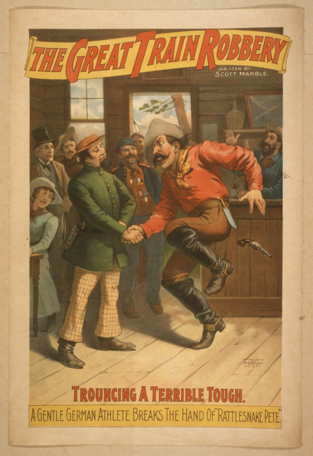 Ein Plakat für "The Great Train Robbery", das eine Gruppe von Menschen mit einer Person, die eine Waffe hält, ein Fenster, eine Wand und Text oben und unten zeigt.