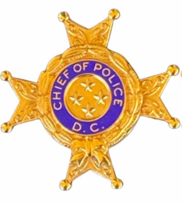 Ein Polizeistern mit der Aufschrift "Polizeipräsident".