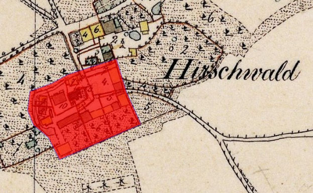 Alte Karte von Hirschwald, Deutschland, mit einem roten Quadrat, das eine zentrale Lage markiert, zeigt Straßen, Gebäude und andere Merkmale mit beschreibendem Text.