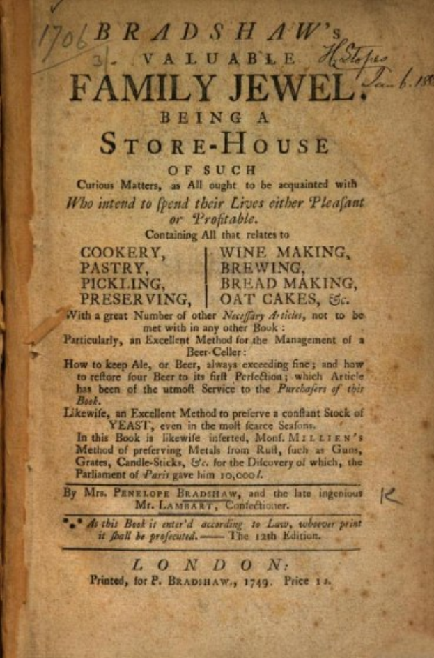 Ein offenes altes Buch mit dem Titel "Family Jewel Being a Store-House" in Kursivschrift und einem dekorativen Rand.