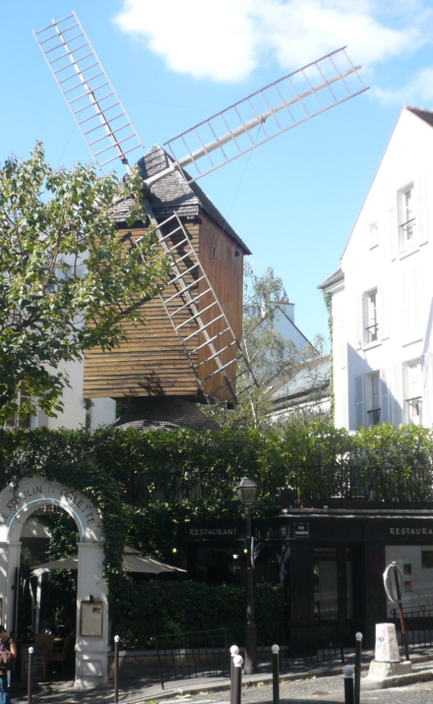 Eine Zeitungsvorderseite mit mehreren Anzeigen und Schlagzeilen.