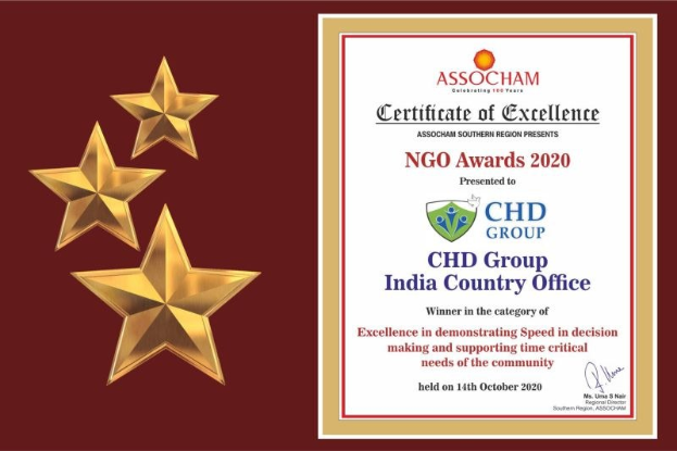 Auszeichnung für die NGO Awards 2020 mit dem Text "Chd Group India Country Office" und einem Schild-Logo mit einem zentralen Stern, umgeben von einem Lorbeerkranz, hervorgehoben durch drei Sterne auf der linken Seite.